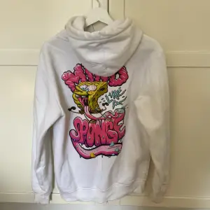 Vit hoodie från HM med tryxk på ryggen