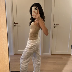 Ribbat linne  - Beiget ribbat linne från NA-KD 🧡säljer för att det används för sällan. I mycket bra skick.