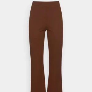 Bell Bottom Tights - Bruna utsvängda tights/leggings   Brand: Monki  Size: XS