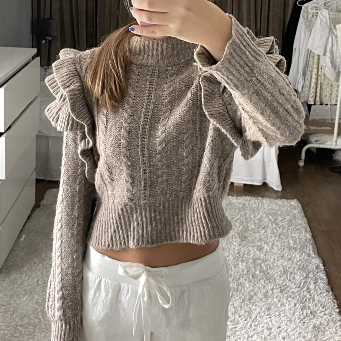 Stickad tröja beige