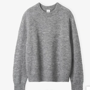 Stickad tröja CW - Jätte fin stickad tröja från Carin Wester i mycket fint skick