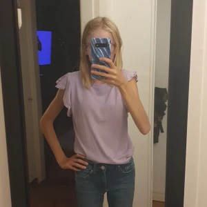 Lila tröja - Tröjan är bara använd några få gånger av mig.