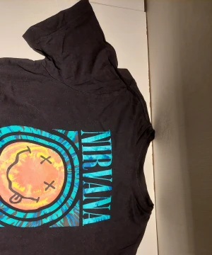 Nirvana T-shirt - Lätt använd, kommer trättad
