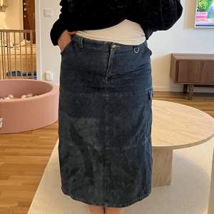 Vintage Maxi denim skirt, has a bleach stain as seen on photo but I still think It looks super cool! Size is unknown but fits like a size 42/44