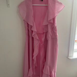 Klänning - Rosa omlottklänningen 