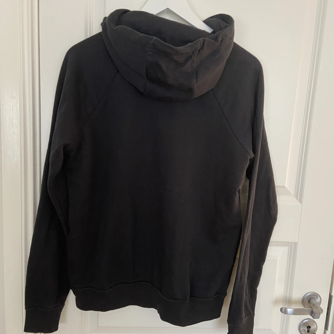 En svart Nike hoddie  - 90