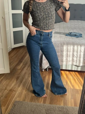 Cotton on body flared jeans - Size 36 but actual size is 34.