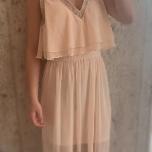 Rosa klänning - Använd en gång. 