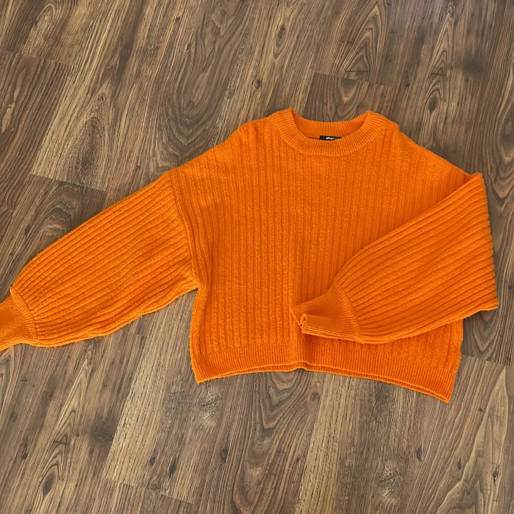 Stickad tröja i en orange poppig färg🧡 Säljs för att den används för lite!. Tröjor & Koftor.