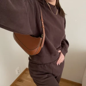 Ginatricot mjukis  - Storlek m i byxorna men är lite mindre i storlek , s i tröjan.