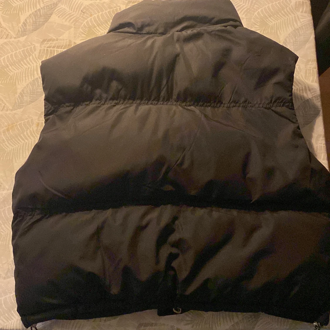 Svart dun väst - 91