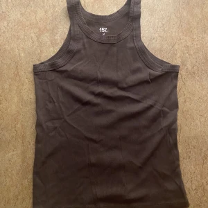 Linne - Brunt linne i bra skick, strl M från lager 157
