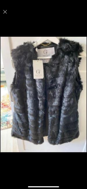 Väst - Strl M. Helt ny.