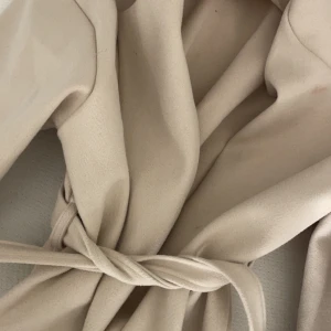 Beige kappa  - Jätte fin beige kappa , aldrig använd