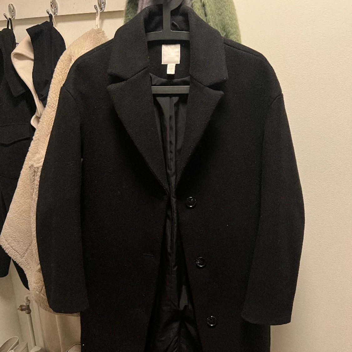 Svart oversize kappa