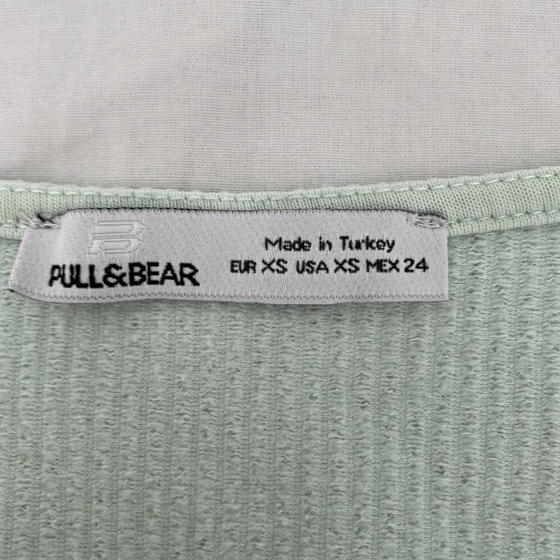 Kort långärmad topp - 90