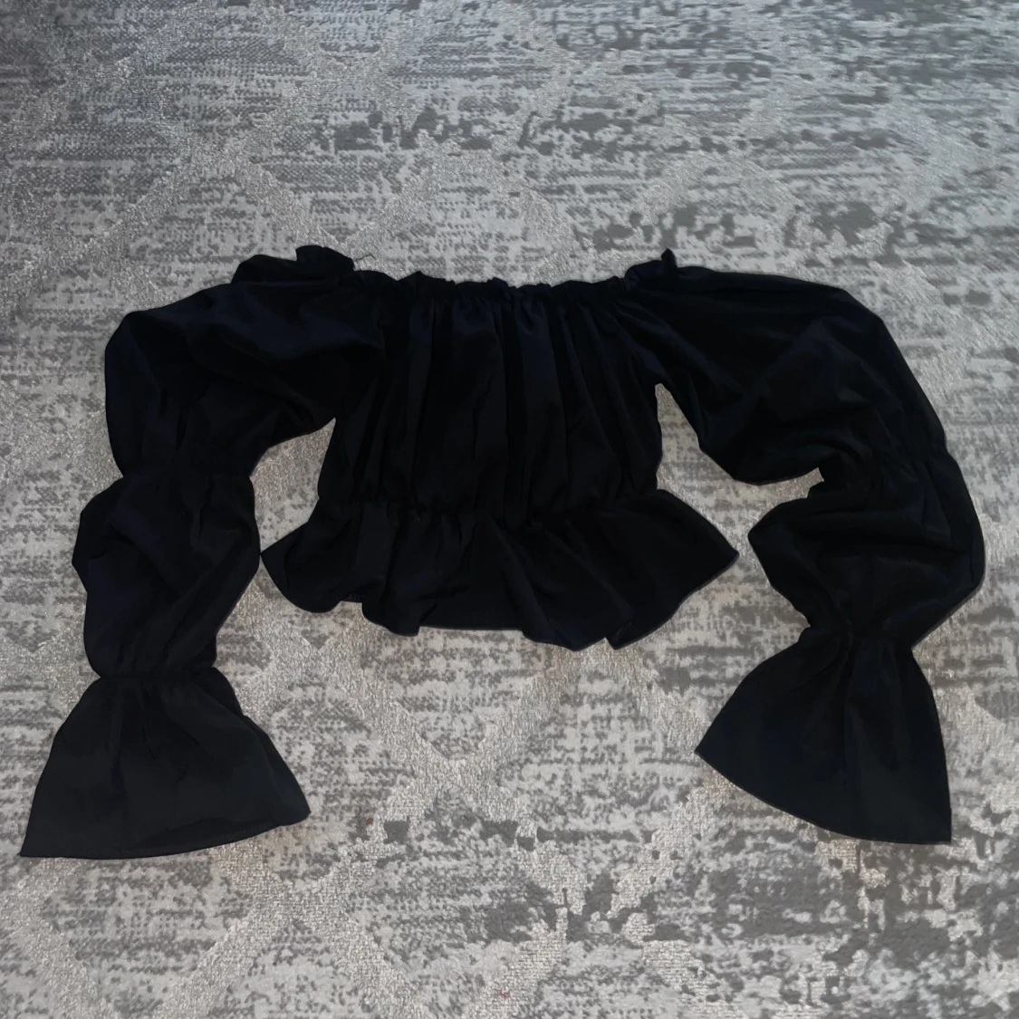 Puffig crop top over the shoulder - 90