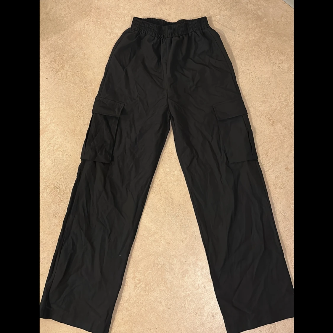 Oanvända cargobyxor