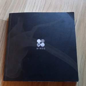 BTS wings album 1 CD lots of photos and lyrics okay condition a little old as you can see