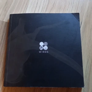 BTS wings album - BTS wings album 1 CD lots of photos and lyrics okay condition a little old as you can see