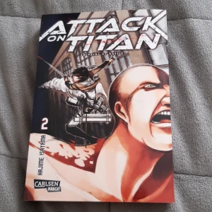 Attack on titan manga vol.2 - The book is in german.  The book is in good condition. The buyer pays for shipping and taxes if included.