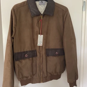 Herr jacka  - Mocka imitation  aldrig använd 
