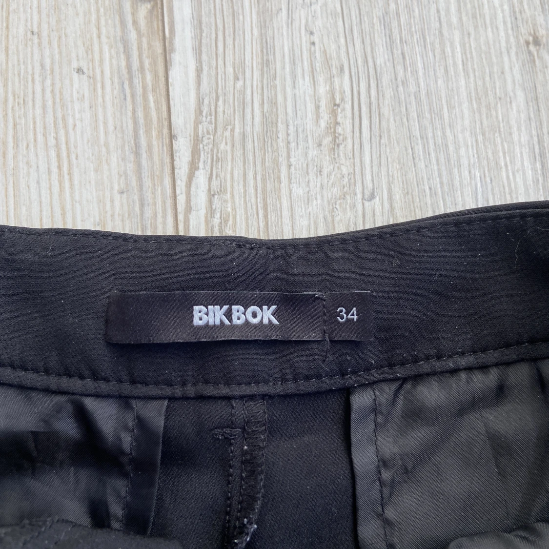 Högmidjade kostymbyxor  - 90