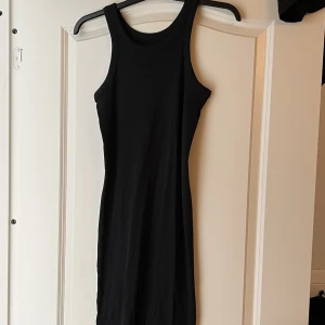 Svart långklänning  - Aldirg använd 