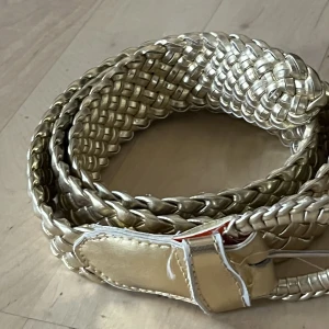 Guld bälte - Guldfärgat bälte. 