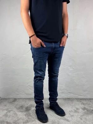 Replay jeans  - Ett par riktigt snygga jeans från replay i storlek W33 L30 i modellen anbbas hyperflex