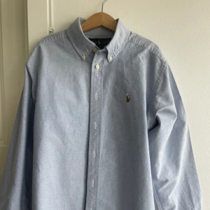 Polo Ralph lauren skjorta ljusblå - Strl 156/12 Skick 8/10 ÄKTA! mycket bra skick skriv vid intresse 
