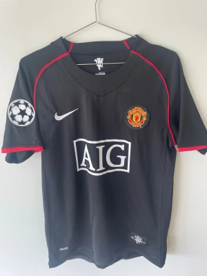 Manchester United Ronaldo tröja svart - Snygg svart Manchester United matchtröja 
