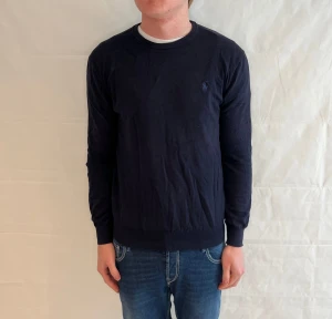 Polo Ralph Lauren Sweater Slim Fit Prima Cotton Blue Men's - Begagnad blå stickad tröja i slim fit av bomull från Polo Ralph Lauren.
