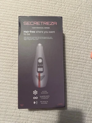Secretreza IPL hårborttagningsapparat  - Secretreza IPL hårborttagningsapparat med ICE Cool Technology och obegränsade skott. Grå och svart design med digital display och smidig form. Utrustad med hudsensor för extra säkerhet. Perfekt för enkel och effektiv hårborttagning hemma.