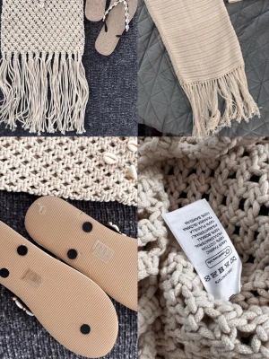 Beach Bundle!  - Säljer en beige strandkjol i virkad bomull med långa fransar nedtill. Tillhörande topp. Samt fin beachbag med snäckor på. Matchas med snygga flipflops med likadana vita snäckor som väskan. Storlek 39!