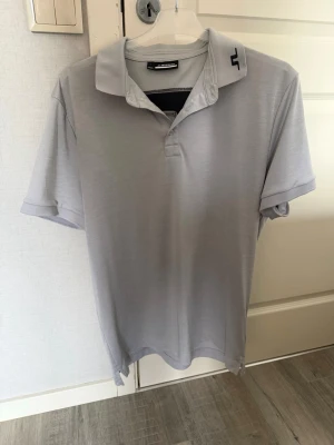 Golfpiké från J.Lindeberg - Använd Max 10 gånger. Storlek L, inhandlad på deras egna hemsida