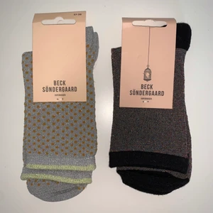 Becksondergaard sokker - Sælger disse glimmersokker, de er aldrig blevet brugt. Og kommer os i ny indoarkining.                                                                                  Mindste pris : 25kr pr.       Ny pris : 50kr pr.