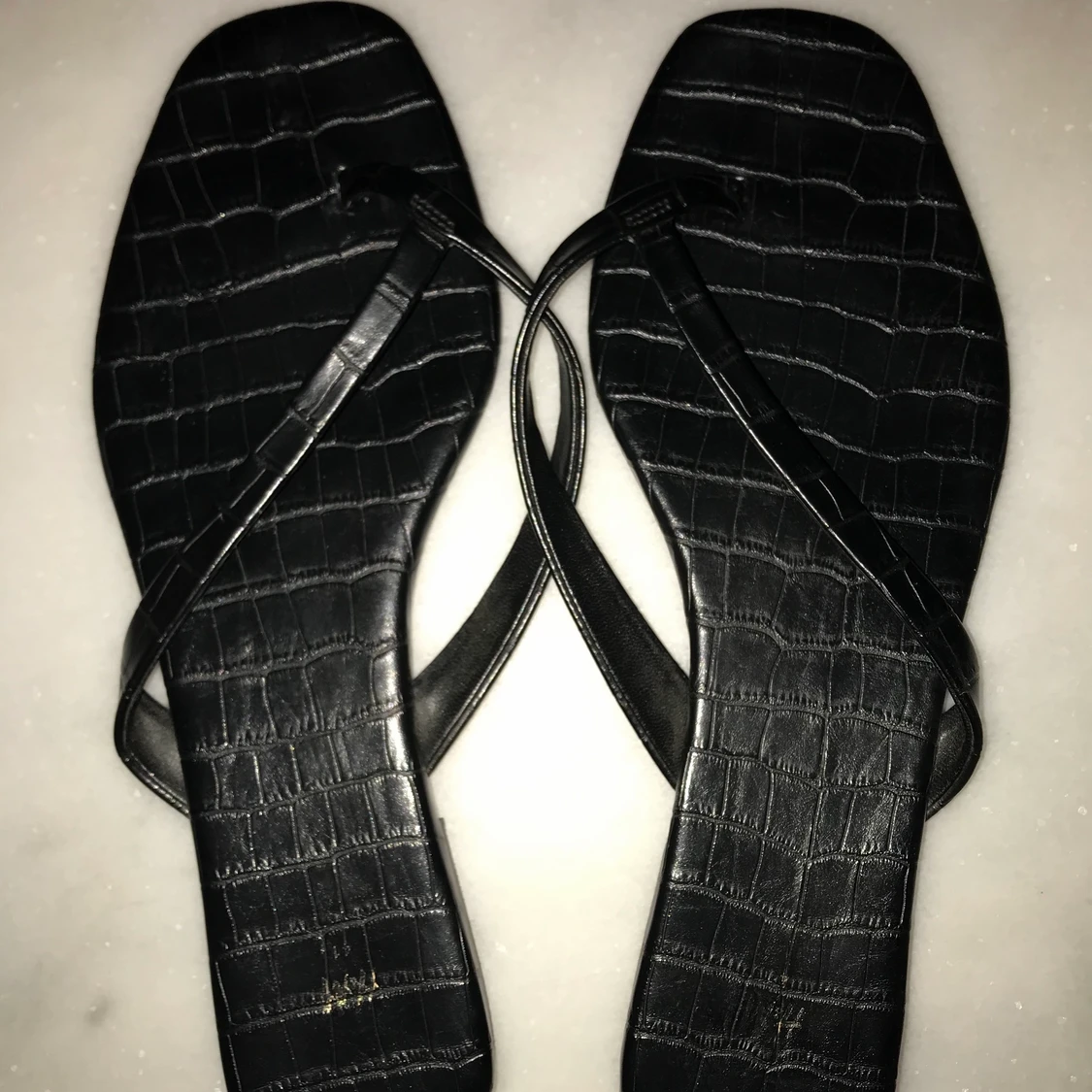 Fake leather flip flops