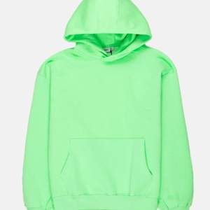 Jätte mysig neon grön sweater som inte kommer till användning
