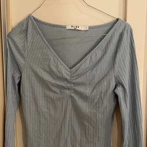 Ljusblå topp - Ljusblå topp från nakd säljer pga av att den inte kommer till användning längre 