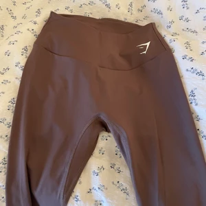 Träningstights - Bruna träningstights från Gymshark, använda en gång! Storlek S🤎