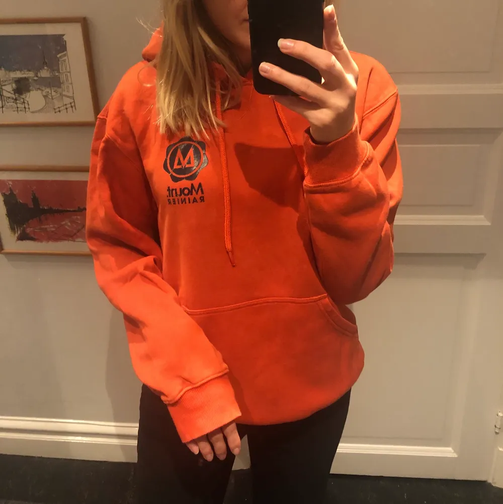 En cool orange hoodie. Hoodies.