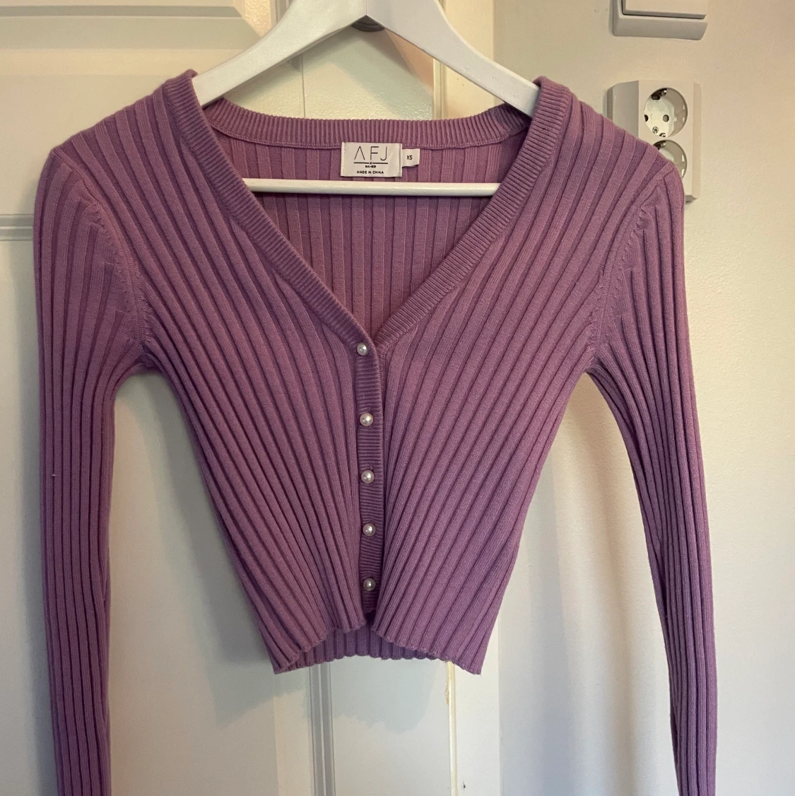 Ribbstickad tröja - 90