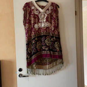 Klänning  - Den är aldrig använda 