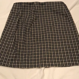 Rutig kjol - Fin rutig kjol, andvänder ej