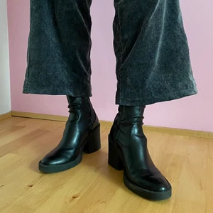 Black boots from Asos  - Boots bought three years ago. Normal fit and comfortable 