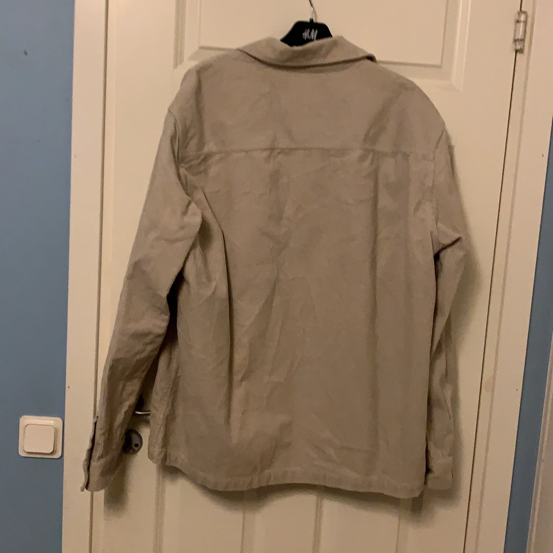 Beige Manchester jacka i storlek XL - 90