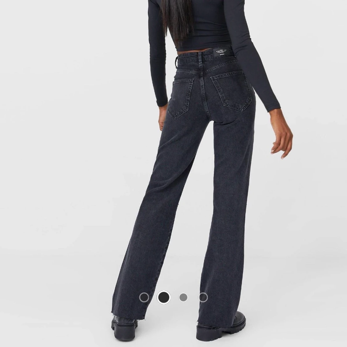 Svarta flared jeans med slits  - 90