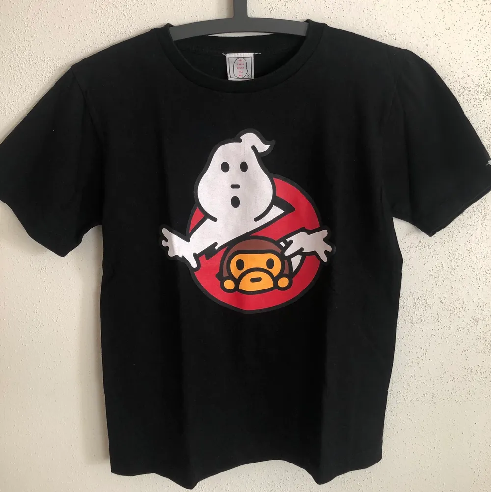 Women’s Vintage Bape / Baby Milo x Ghostbusters T-Shirt  Size small, women’s fit.  Great condition, no flaws or damage.  DM if you need exact size measurements.   Buyer pays for all shipping costs. All items sent with tracking number.   No swaps, no trades, no offers. . T-shirts.