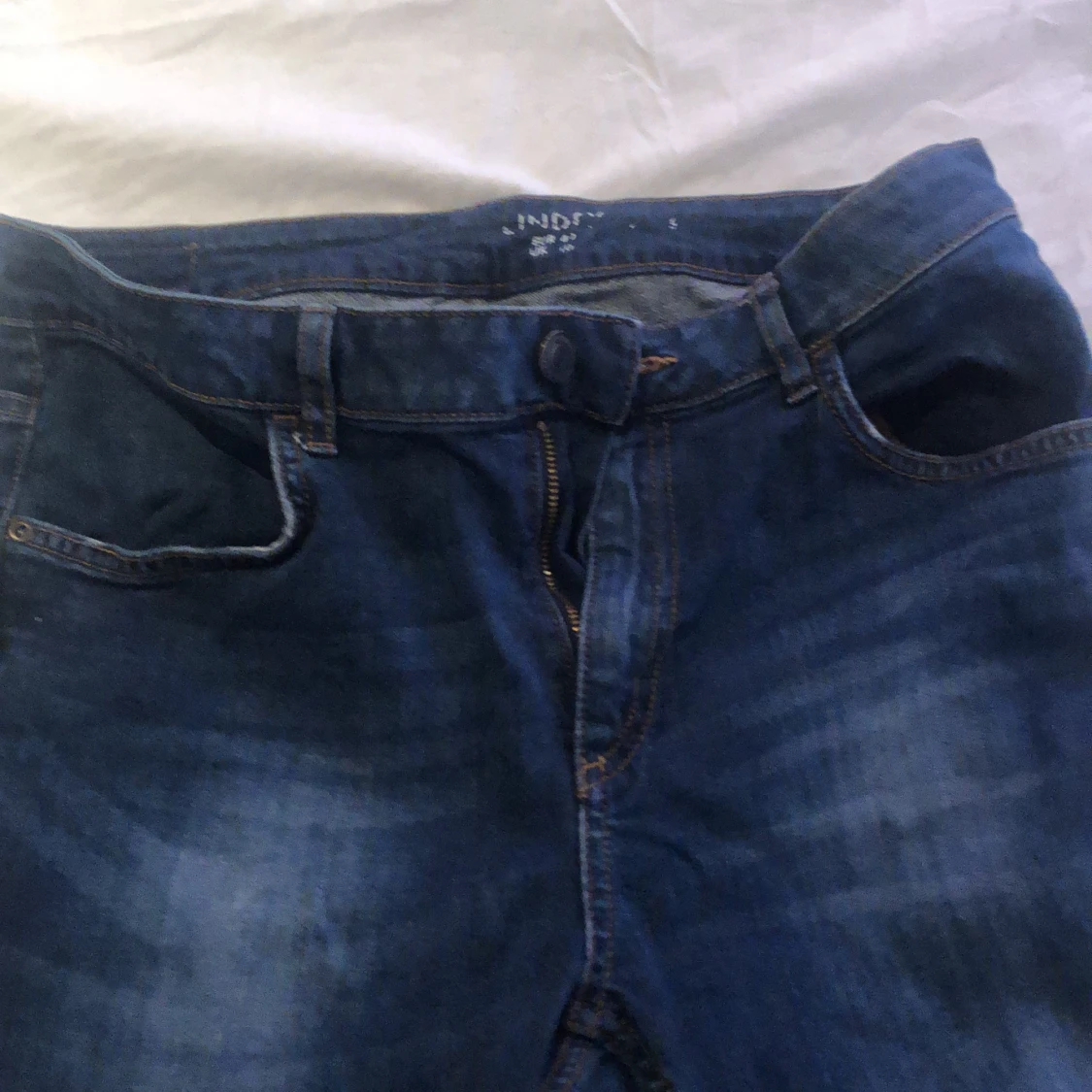 Ett par blåa jeans  - 90